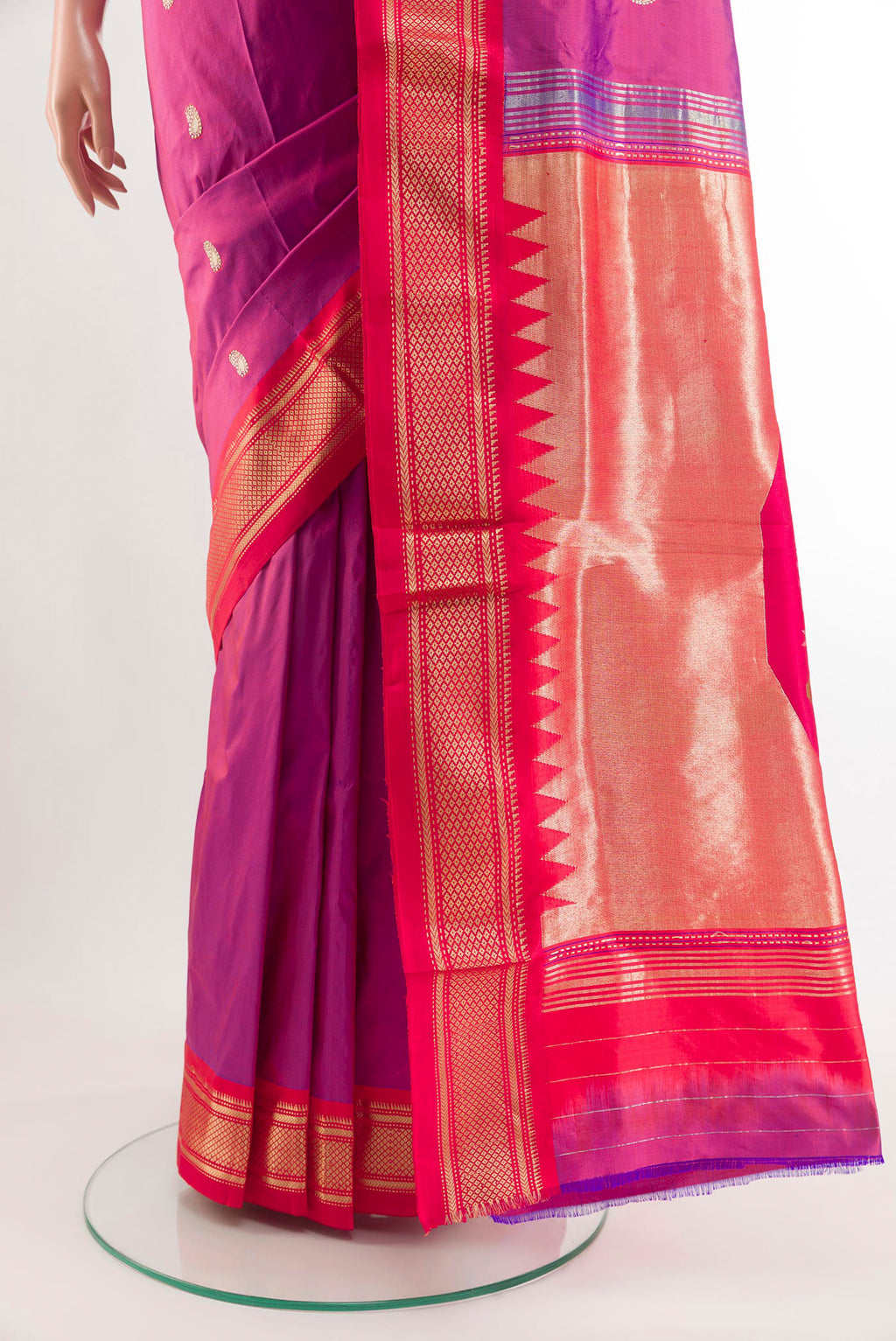 Pleats and pallu of Purple Paithani Silk Saree with Zari Butta on the body and Zari Border. 