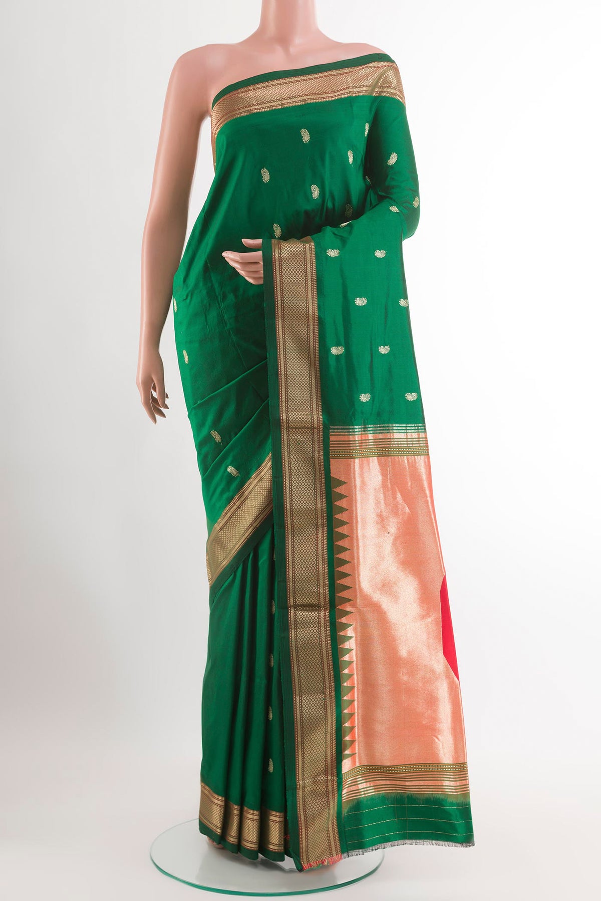 Green Paithani Silk Saree with Zari Butta on the body and Zari Border.  displayed on a mannequin