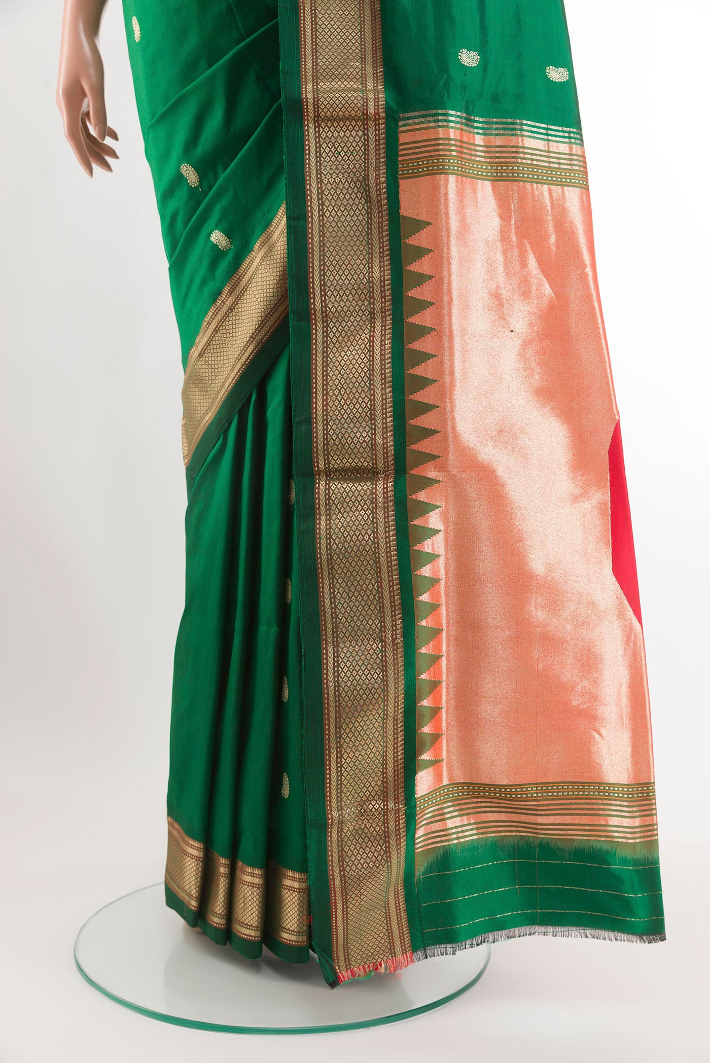 Pleats and pallu of Green Paithani Silk Saree with Zari Butta on the body and Zari Border. 