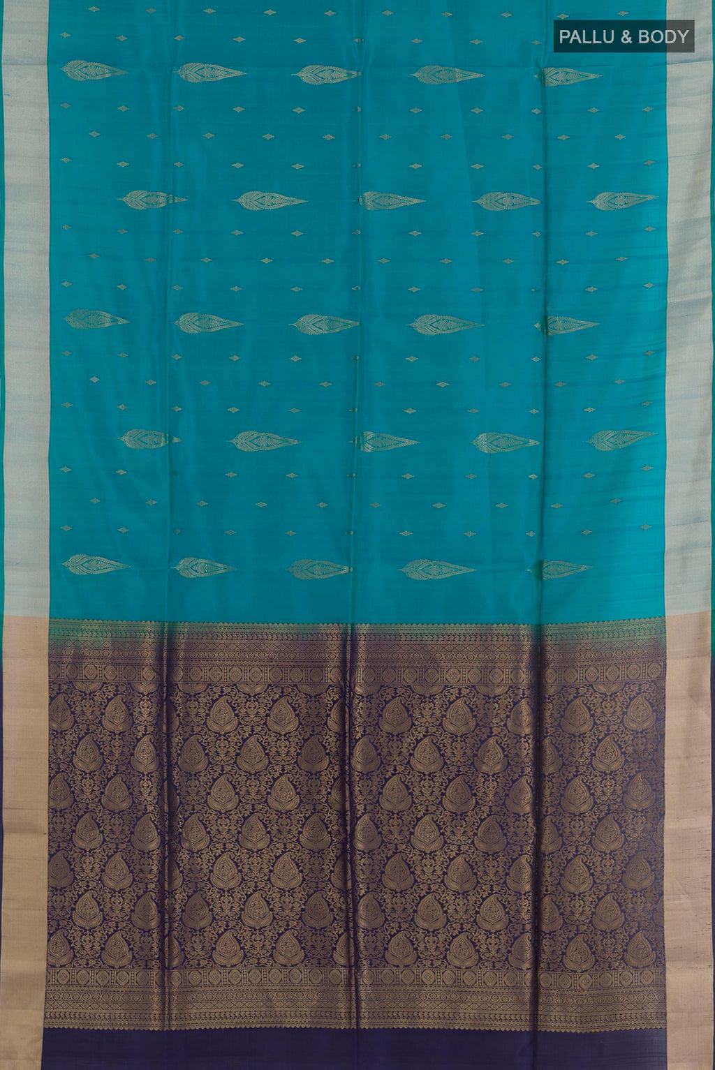 Flat view of Blue Soft Silk Saree with Zari Butta on the body and Zari Border. 