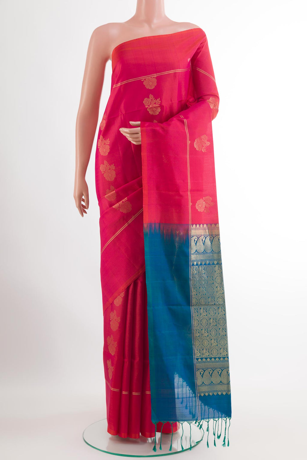 Pink Soft Silk Saree with Zari Butta on the body and Zari Border.  displayed on a mannequin