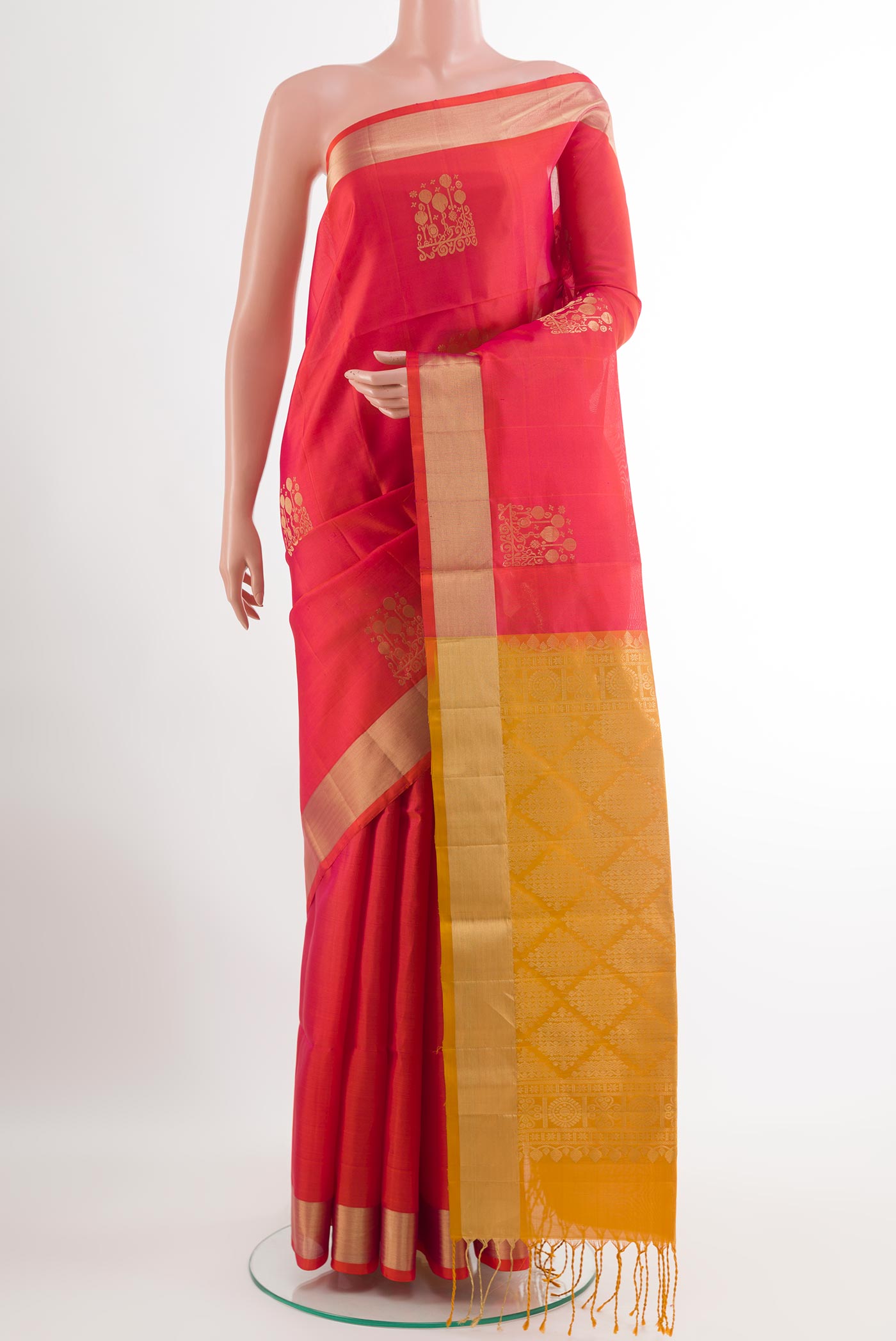 Red Soft Silk Saree with Zari Butta on the body and Zari Border.  displayed on a mannequin