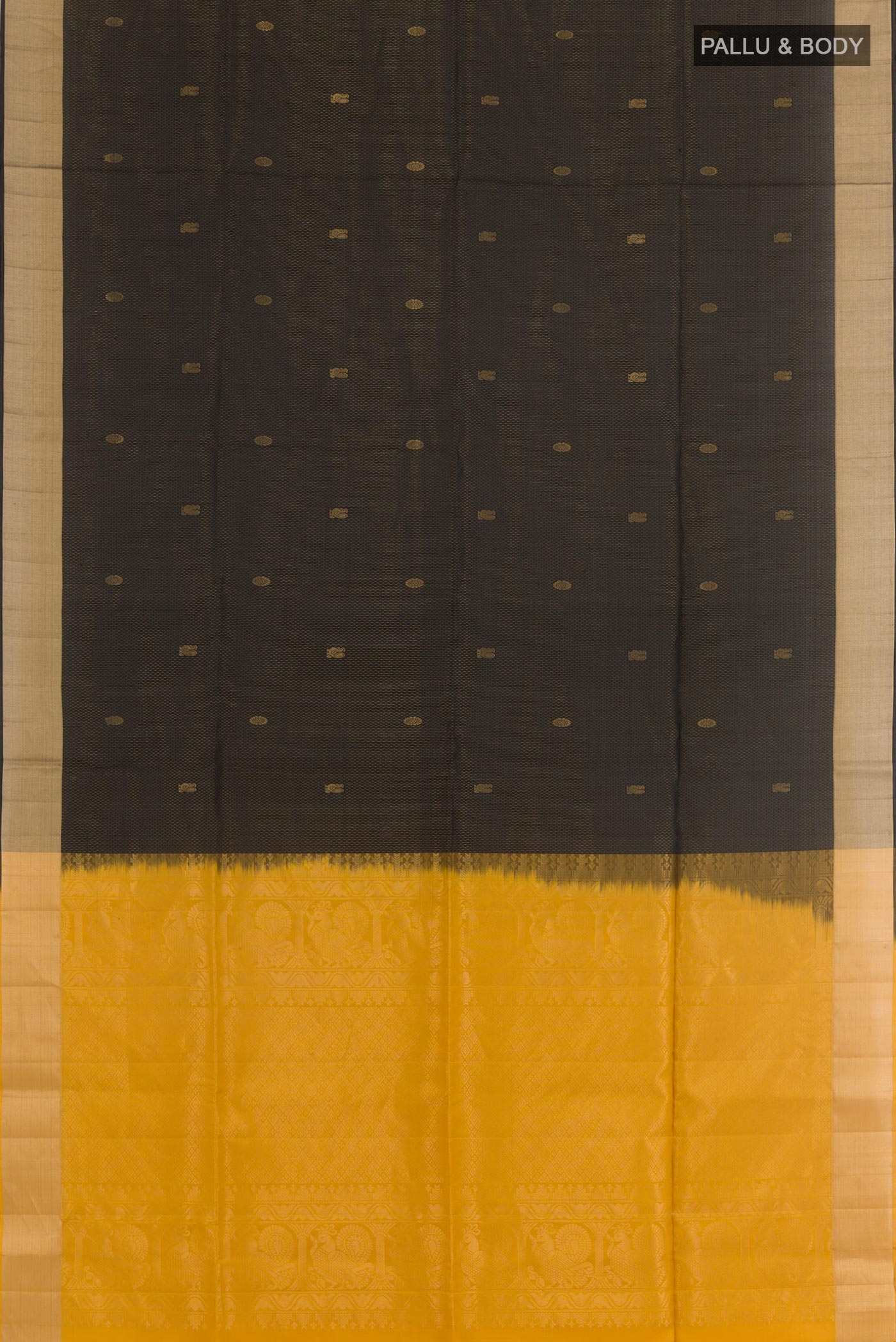 Flat view of Black Soft Silk Saree with Zari Butta on the body and Zari Border. 