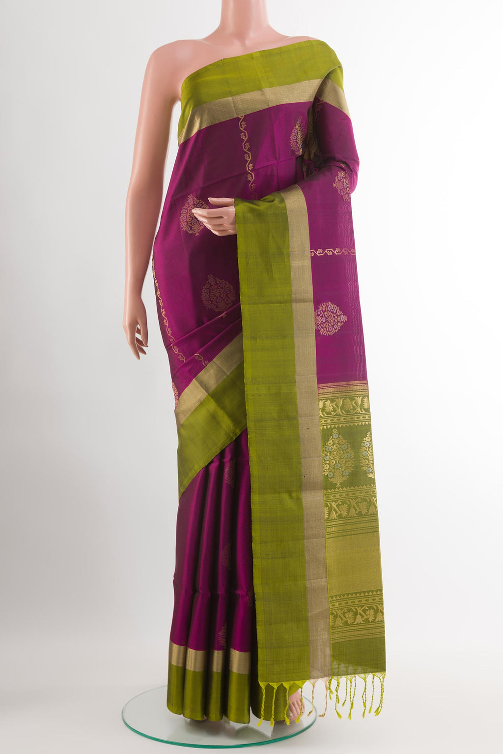 Purple Soft Silk Saree with Zari Butta on the body and Zari Border.  displayed on a mannequin