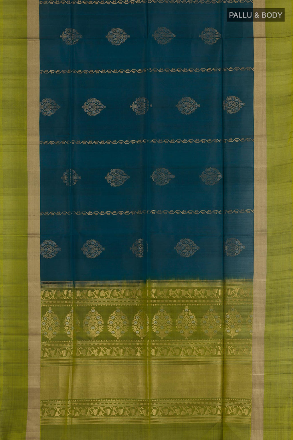 Flat view of Teal Soft Silk Saree with Zari Butta on the body and Zari Border. 