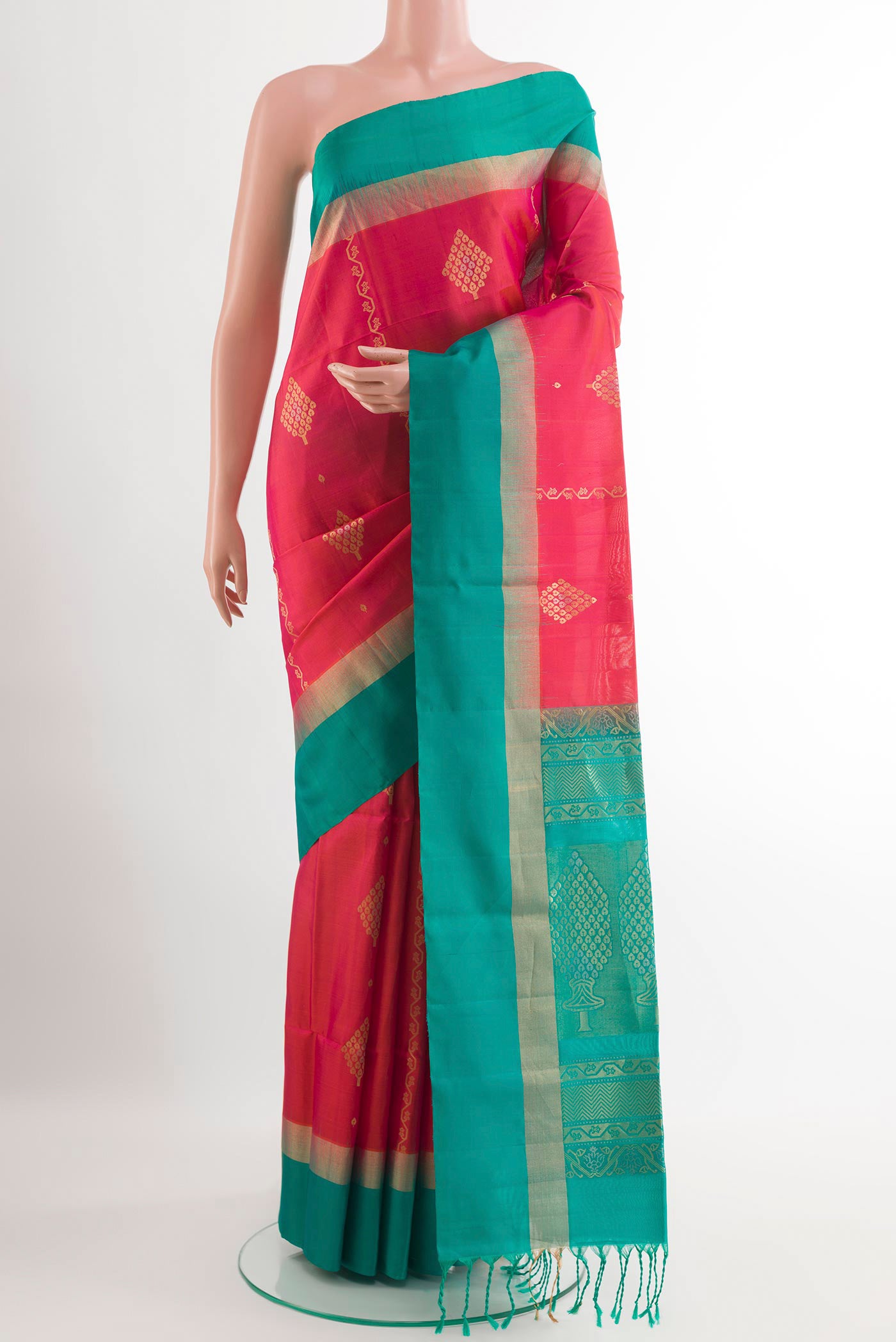 Pink Soft Silk Saree with Zari Butta on the body and Zari Border.  displayed on a mannequin