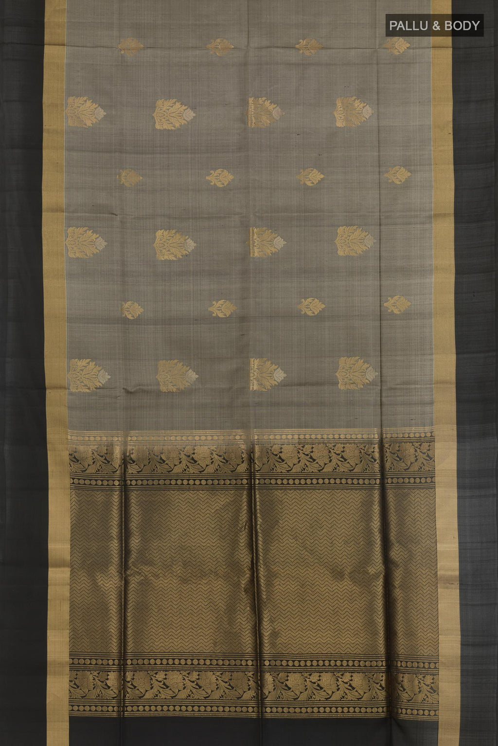 Flat view of Grey Soft Silk Saree with Zari Butta on the body and Zari Border. 