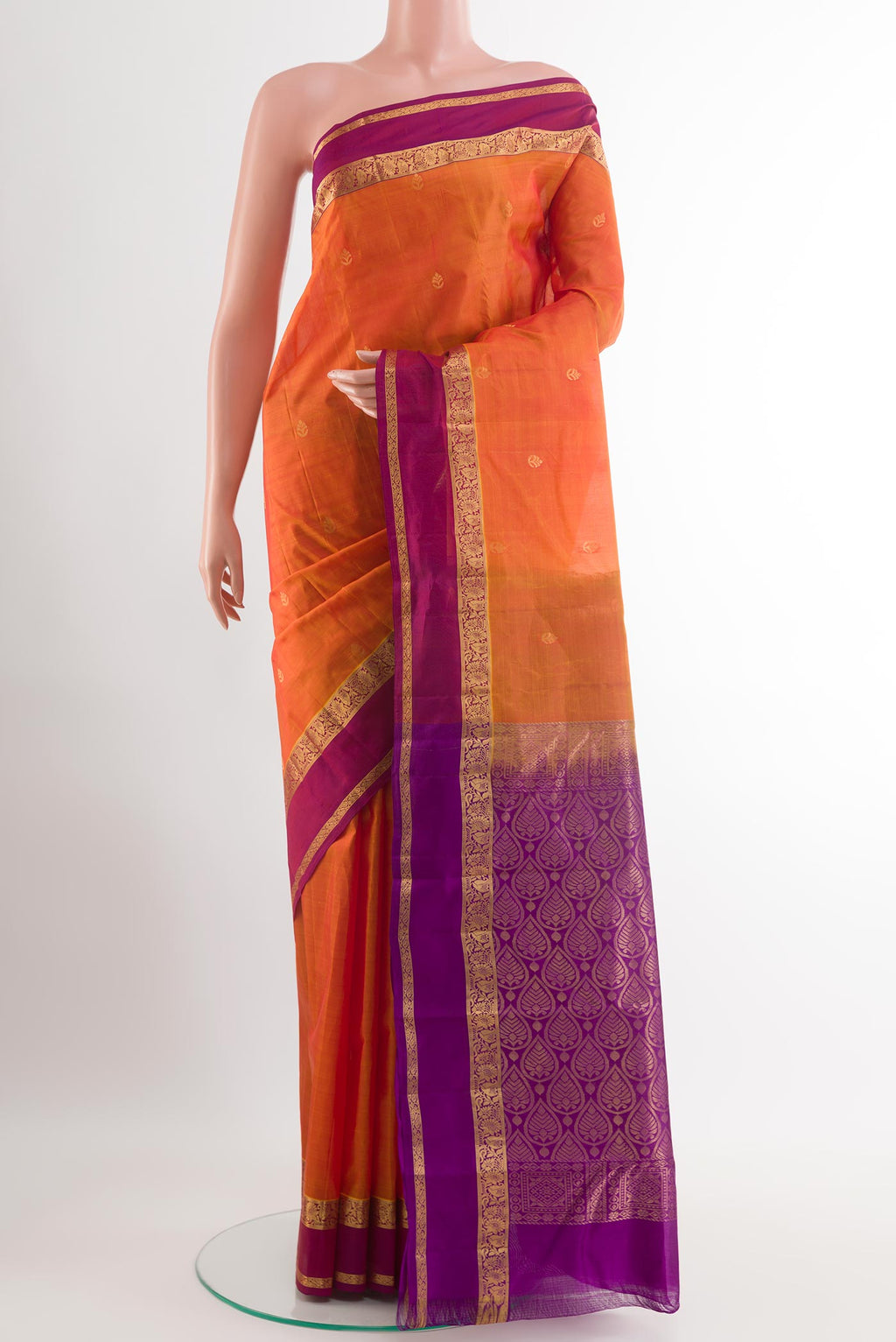 Orange Kanjivaram Silk Saree with Zari Butta on the body and Paithani Border.  displayed on a mannequin