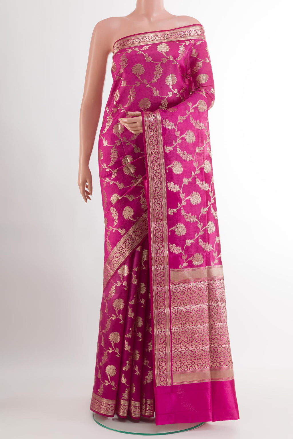 Rani Pink Tussar Silk Saree with Zari Brocade on the body and Zari Border.  displayed on a mannequin