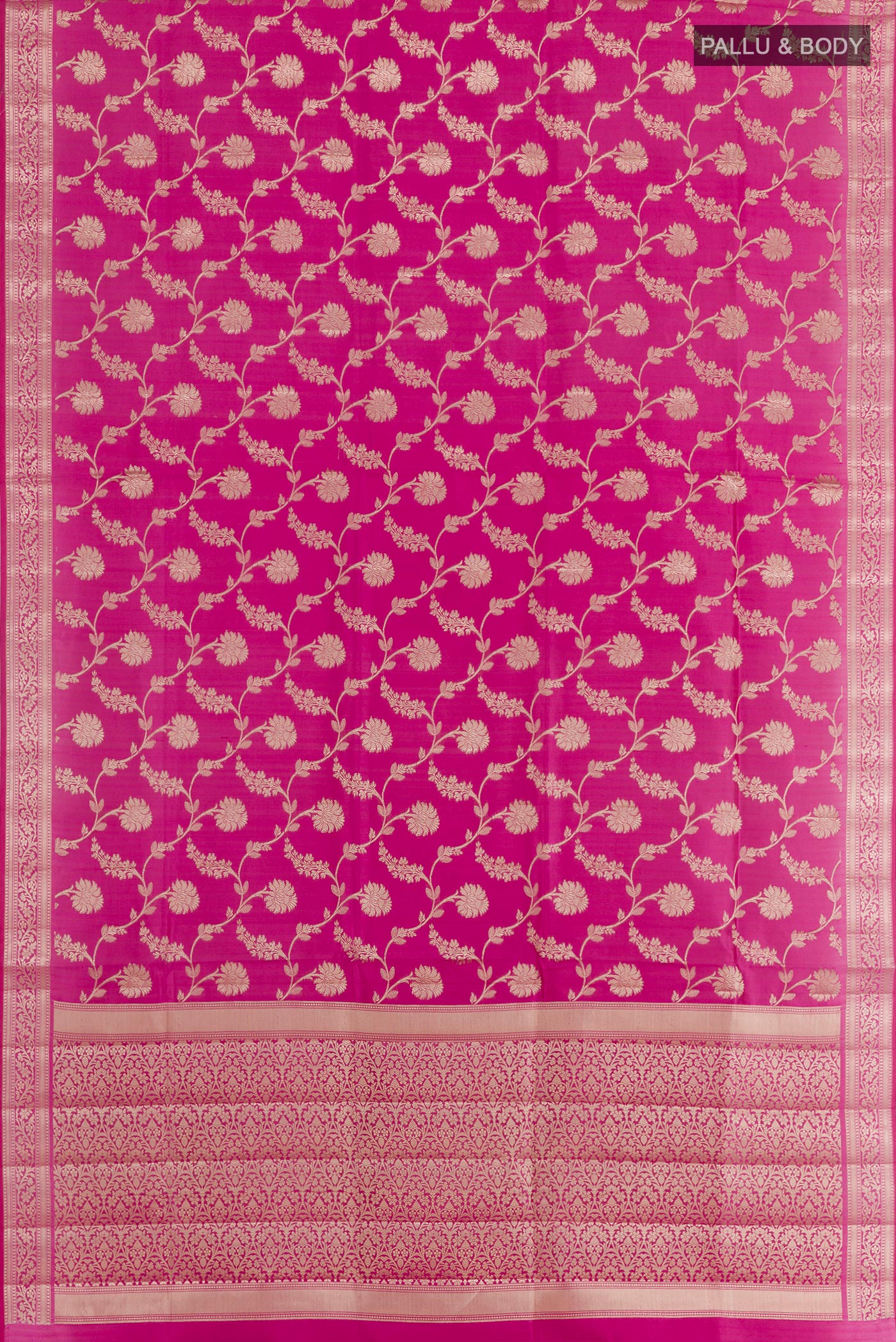Flat view of Rani Pink Tussar Silk Saree with Zari Brocade on the body and Zari Border. 