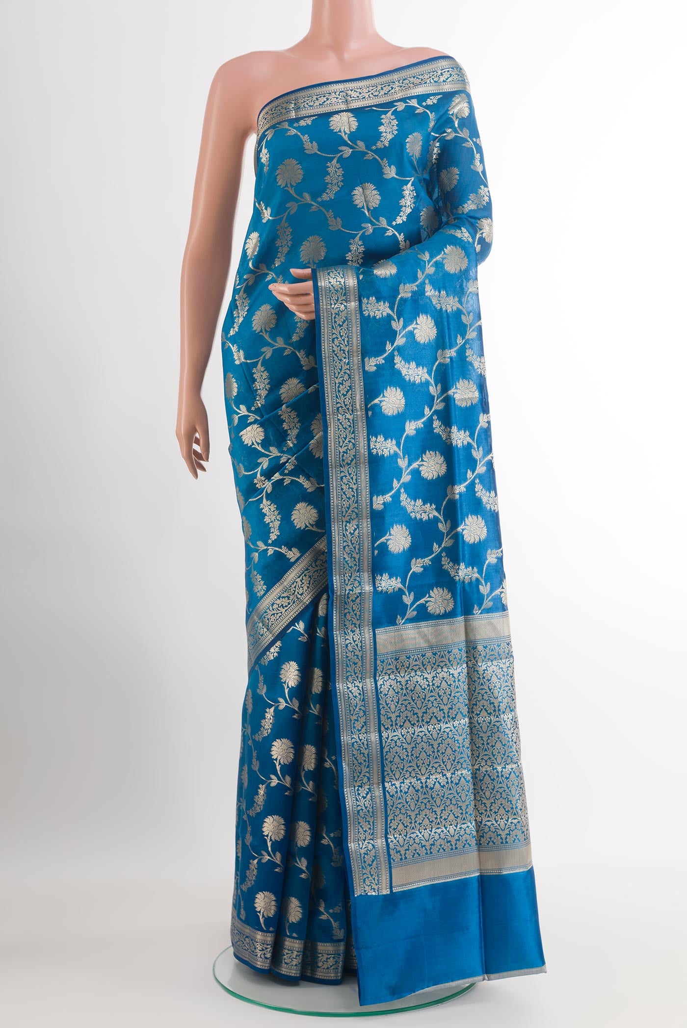 Blue Banarasi Tussar Silk Saree with Zari Brocade on the body and Zari Border.  displayed on a mannequin