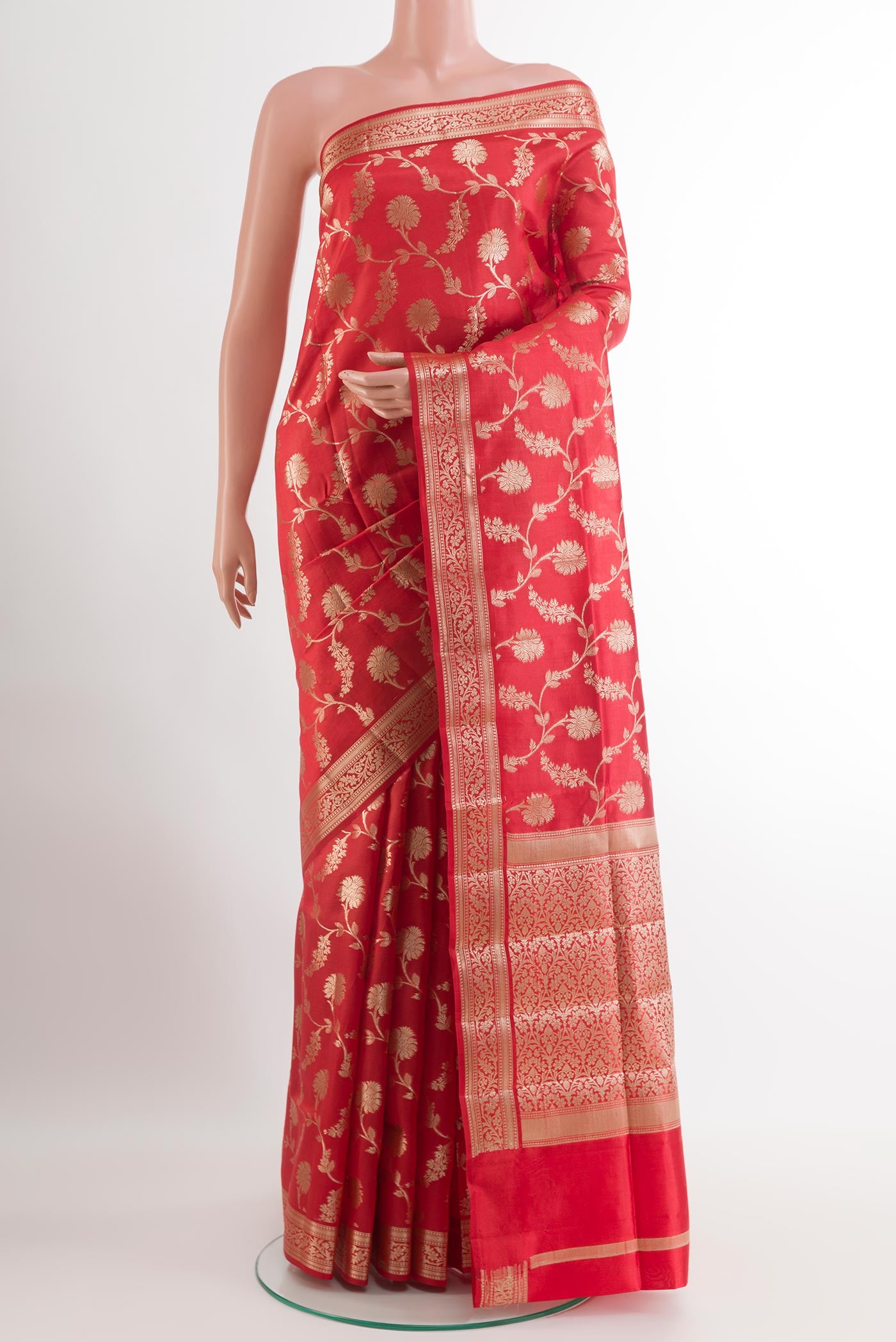Red Tussar Silk Saree with Zari Brocade on the body and Zari Border.  displayed on a mannequin