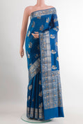 Blue Tussar Silk Saree with Zari Butta on the body and Zari Border.  displayed on a mannequin