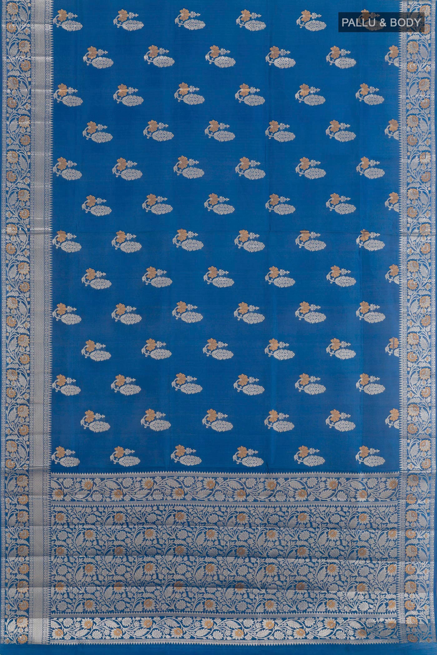Flat view of Blue Tussar Silk Saree with Zari Butta on the body and Zari Border. 