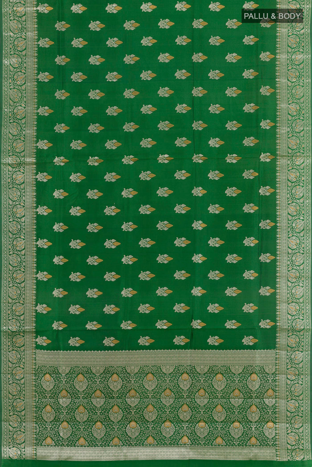Flat view of Green Tussar Silk Saree with Zari Butta on the body and Zari Border. 