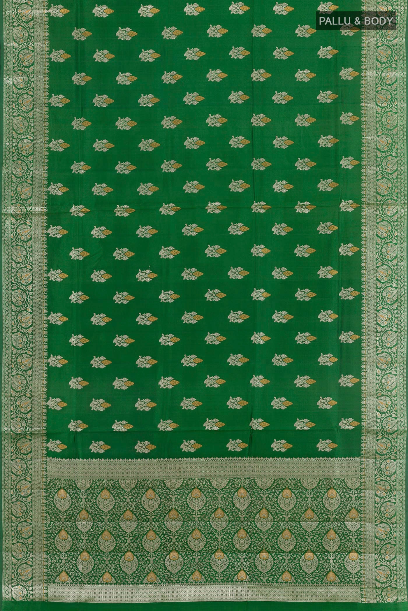 Flat view of Green Tussar Silk Saree with Zari Butta on the body and Zari Border. 