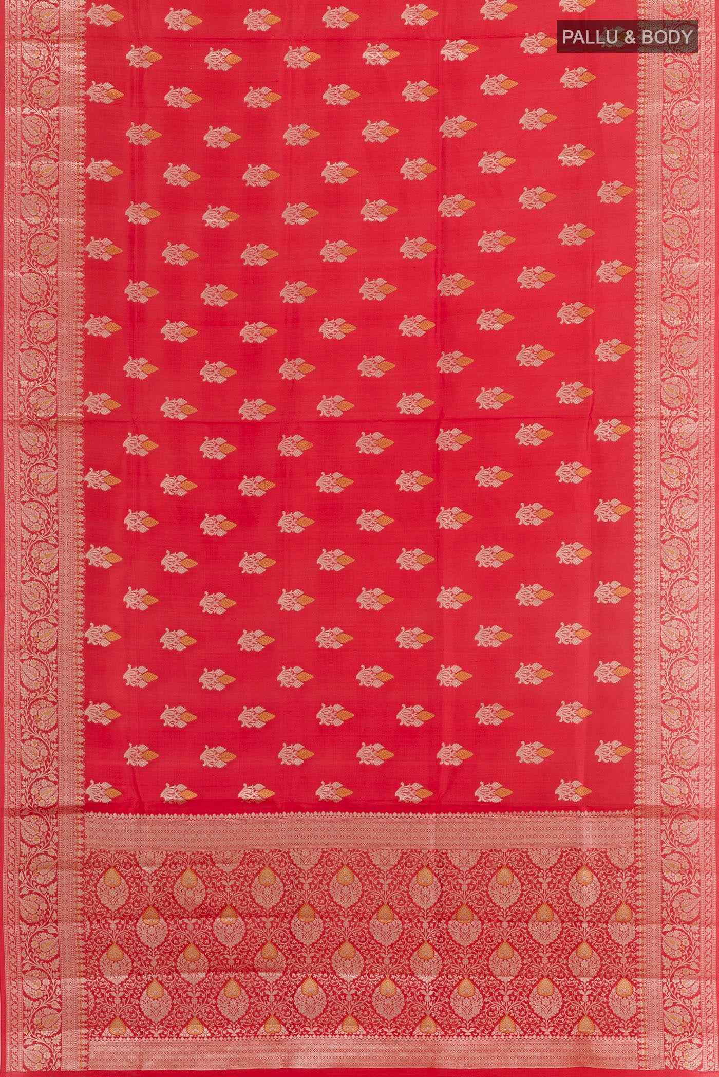 Flat view of Red Tussar Silk Saree with Zari Butta on the body and Zari Border. 