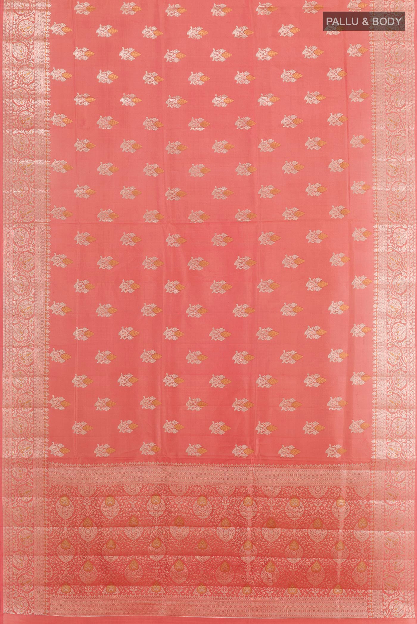 Flat view of Peach Tussar Silk Saree with Zari Butta on the body and Zari Border. 