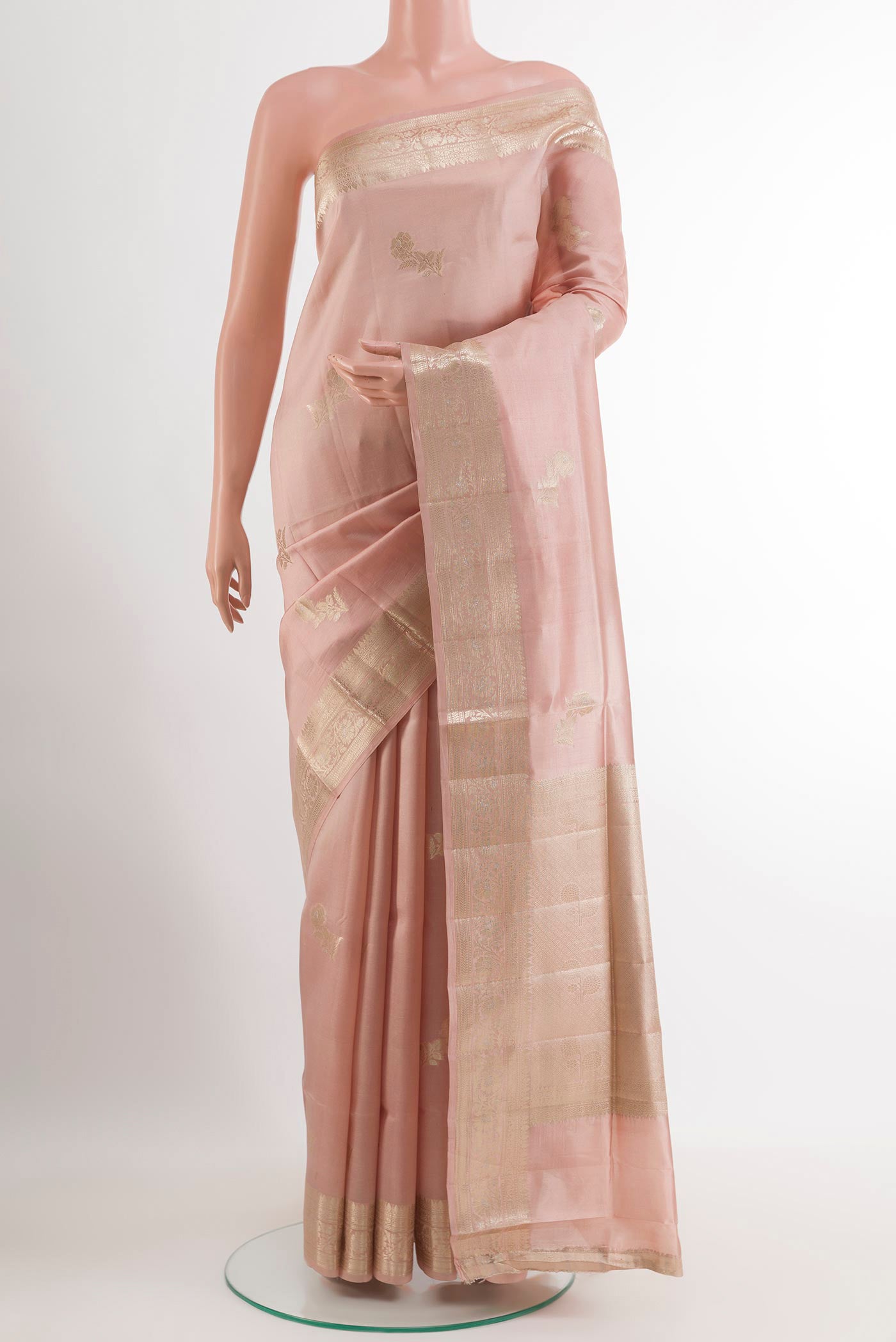 Imperial Pink Tussar Silk Saree with Zari Butta on the body and Zari Border.  displayed on a mannequin