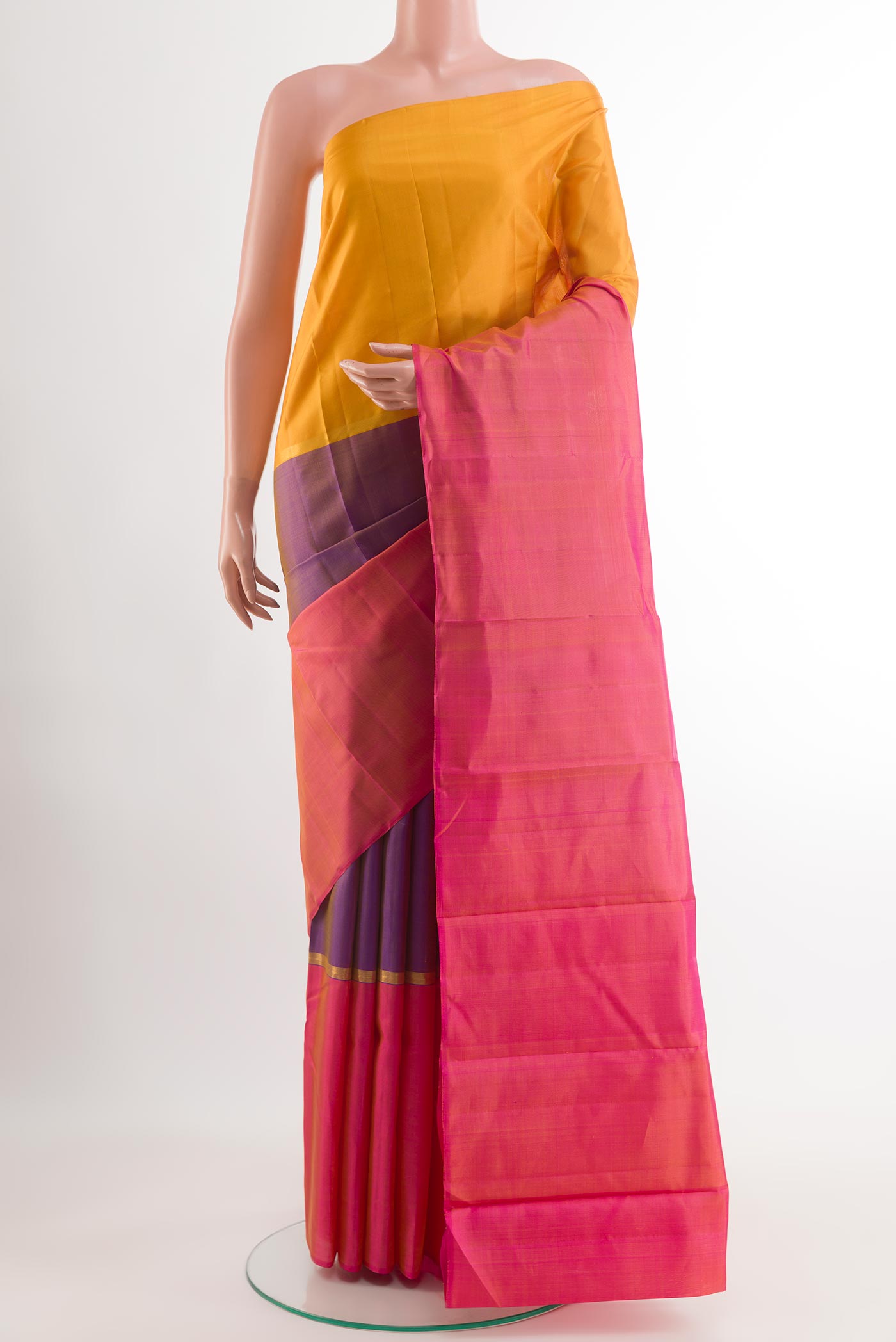 Multi Color Kanjivaram Silk Saree with Stripes on the body and Zari Border.  displayed on a mannequin