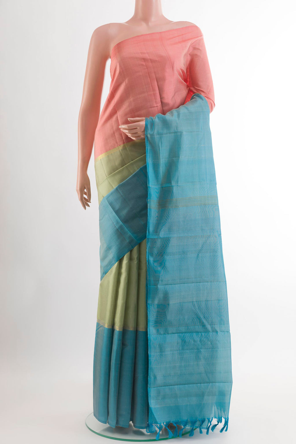 Multi Color Kanjivaram Silk Saree with Stripes on the body and Zari Border.  displayed on a mannequin