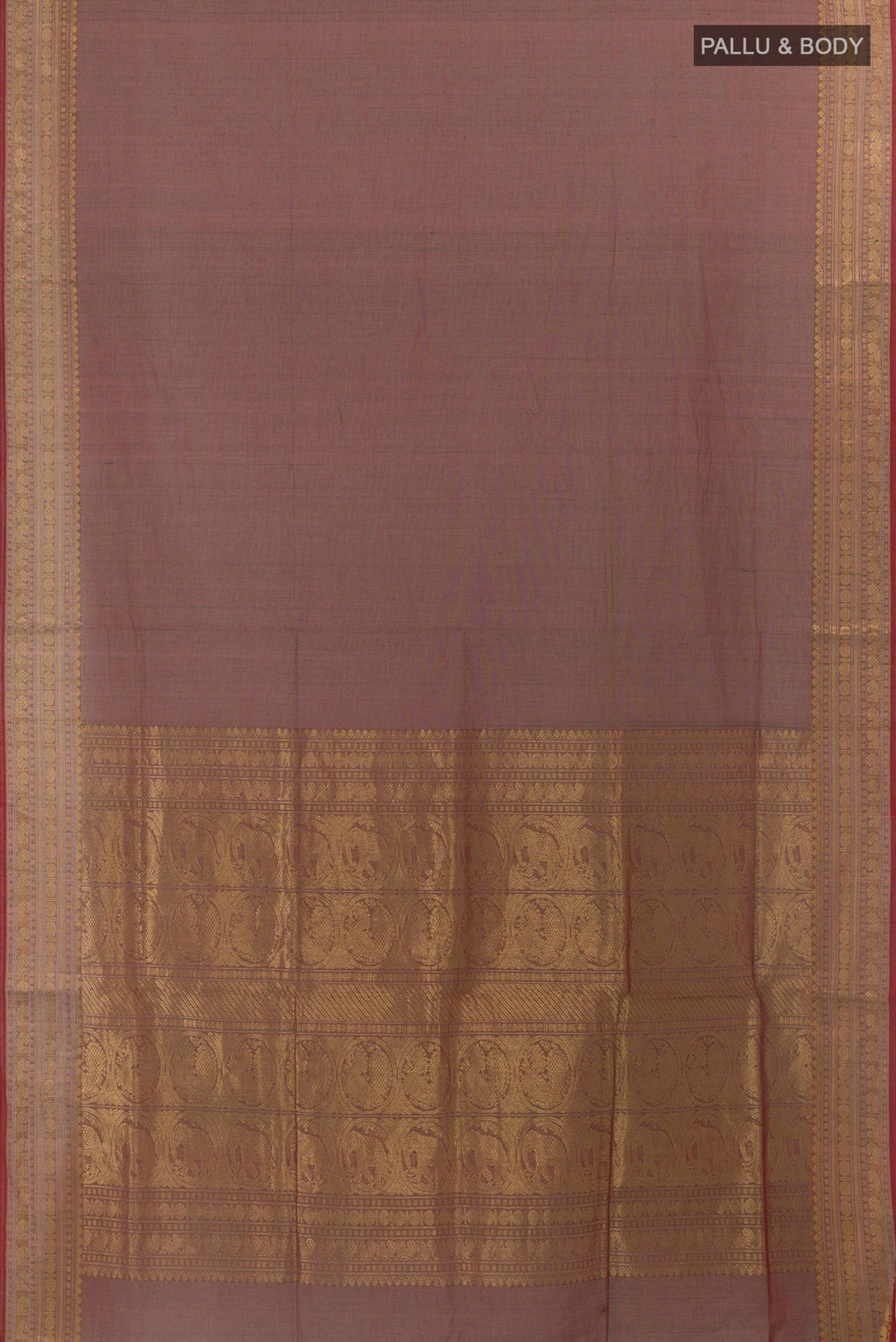 Flat view of Brown Coimbatore Cotton Saree with Plain Body and Zari Border. 