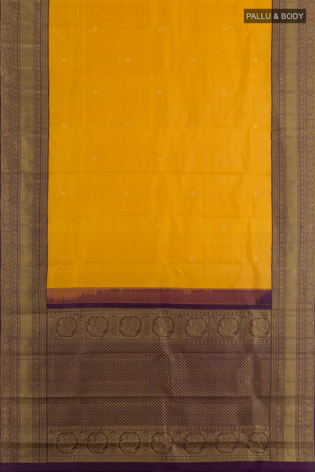 Flat view of Mustard Kanchipuram Silk Saree with Zari Butta on the body and Zari Border. 