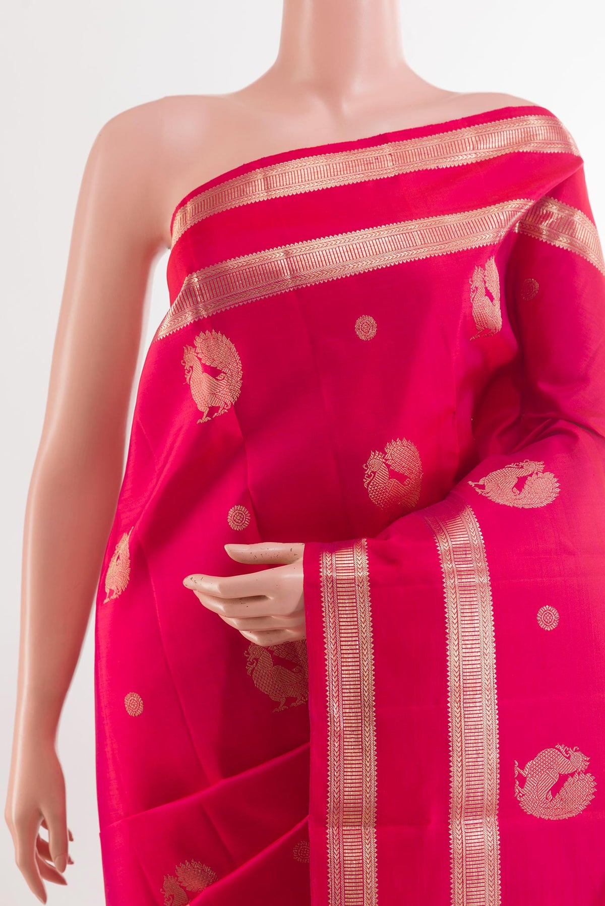 Border image of Red Kanjivaram Silk Saree with Zari Butta on the body and Zari Border. 