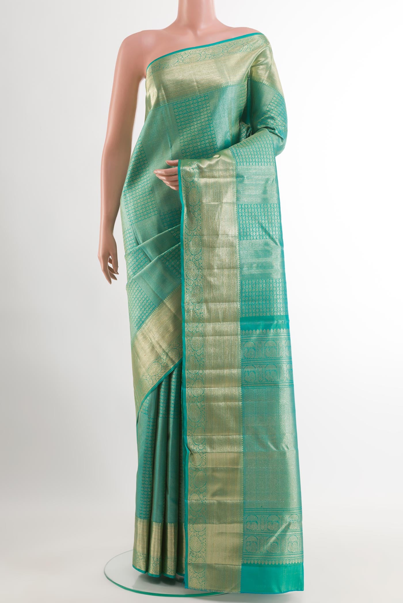 Blue Kanchipuram Silk Saree with Zari Brocade on the body and Zari Border.  displayed on a mannequin