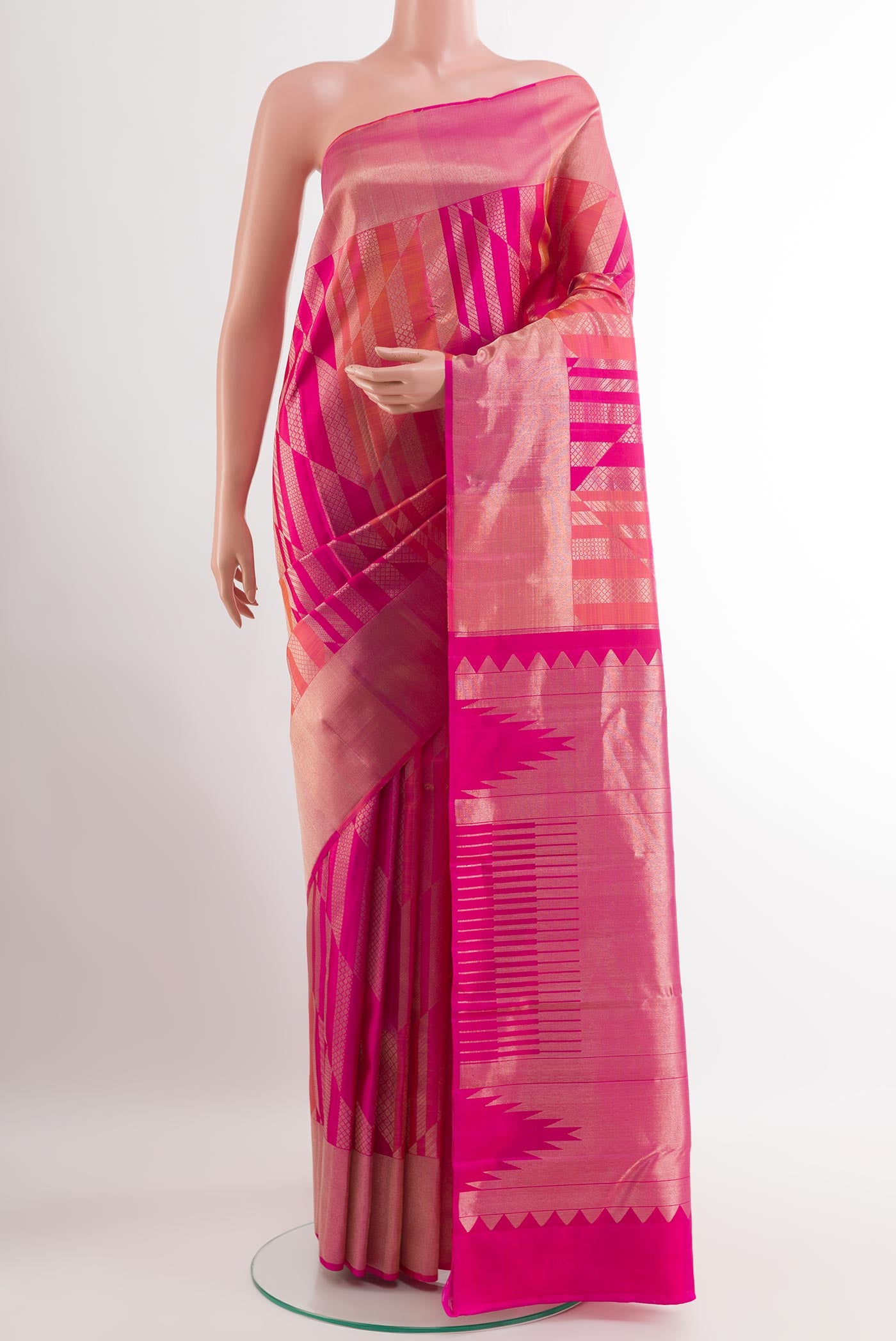 Rani Pink Kanchipuram Silk Saree with Zari Brocade on the body and Zari Border.  displayed on a mannequin
