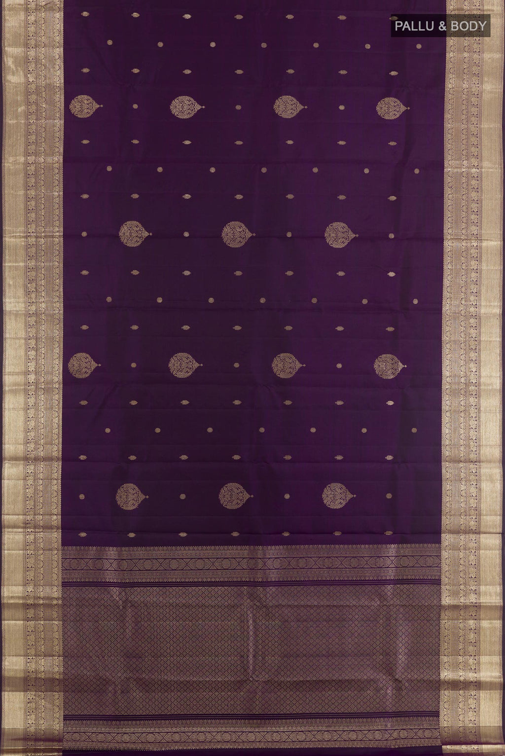 Flat view of Purple Kanjivaram Silk Saree with Zari Butta on the body and Zari Border. 