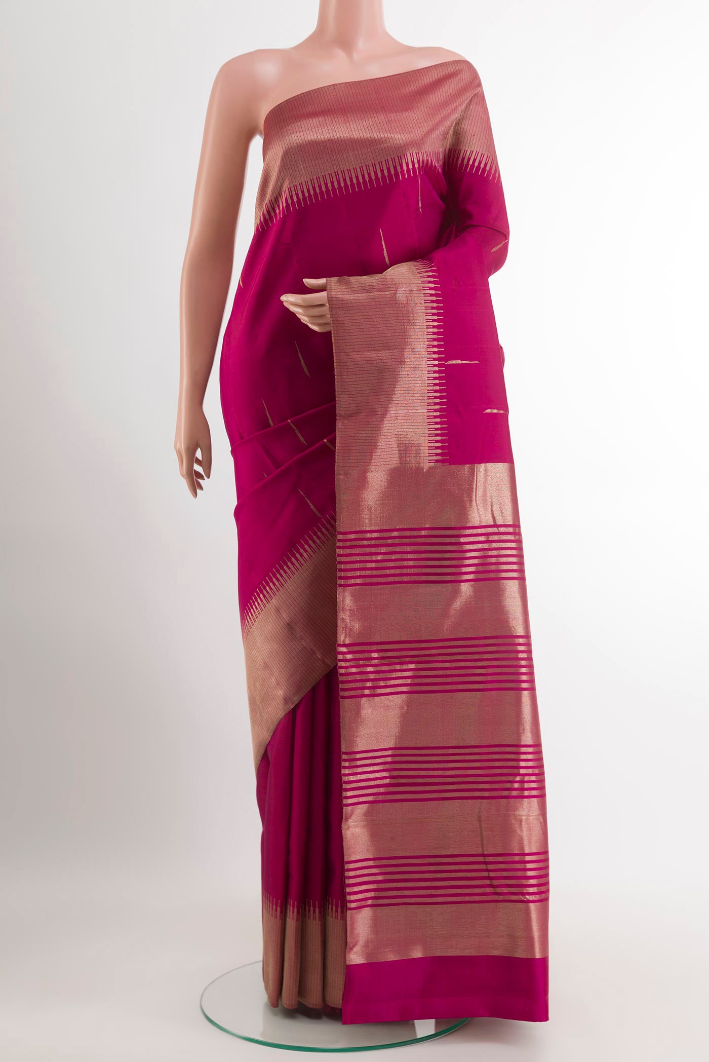 Purple Kanjivaram Silk Saree with Zari Butta on the body and Zari Border.  displayed on a mannequin