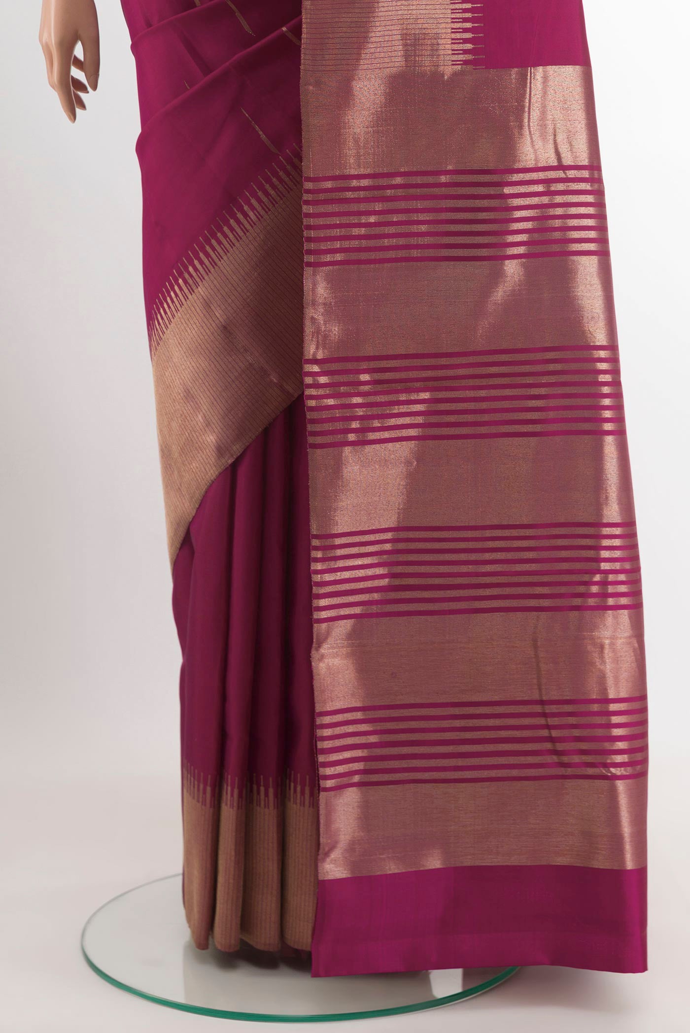 Pleats and pallu of Purple Kanjivaram Silk Saree with Zari Butta on the body and Zari Border. 