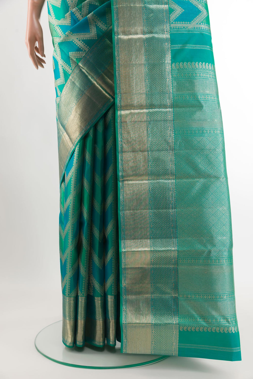 Pleats and pallu of Green Kanjivaram Silk Saree with Zari Brocade on the body and Zari Border. 