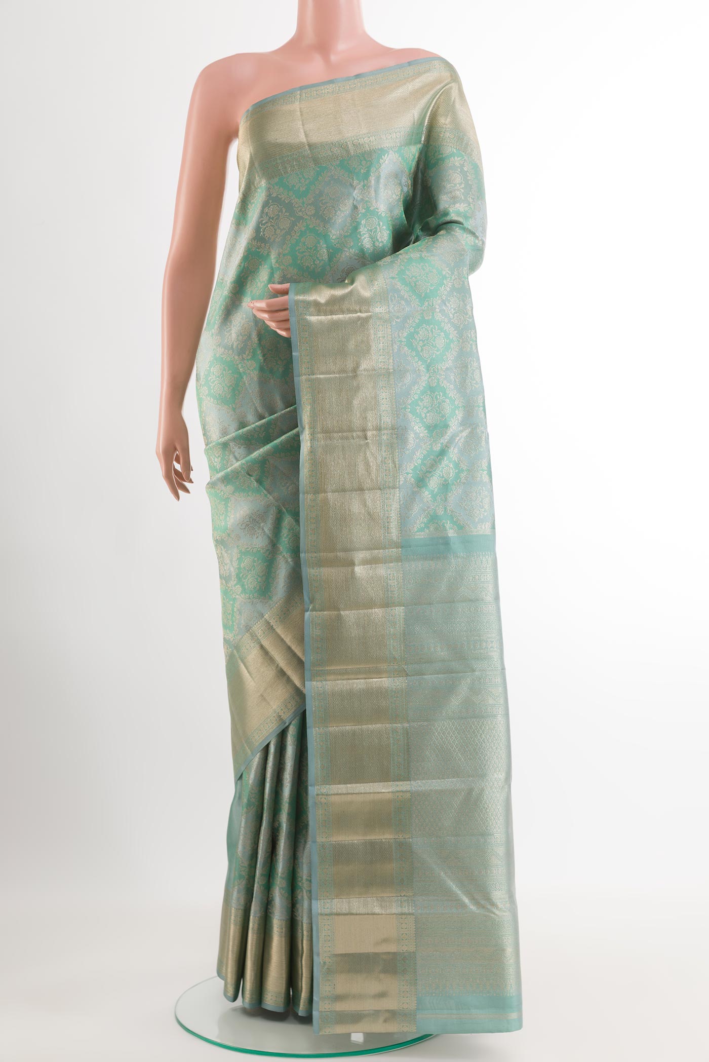 Blue Grey Kanjivaram Silk Saree with Zari Brocade on the body and Zari Border.  displayed on a mannequin