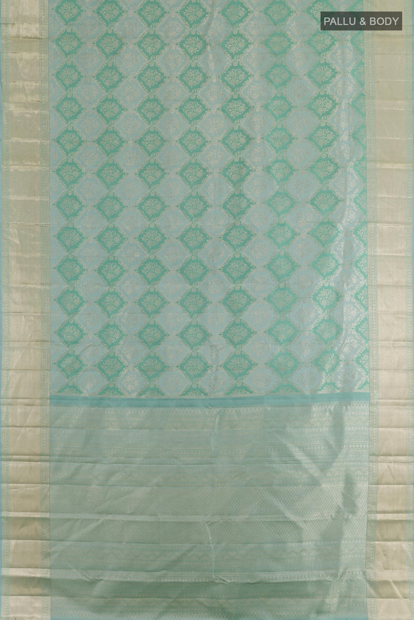 Flat view of Blue Grey Kanjivaram Silk Saree with Zari Brocade on the body and Zari Border. 