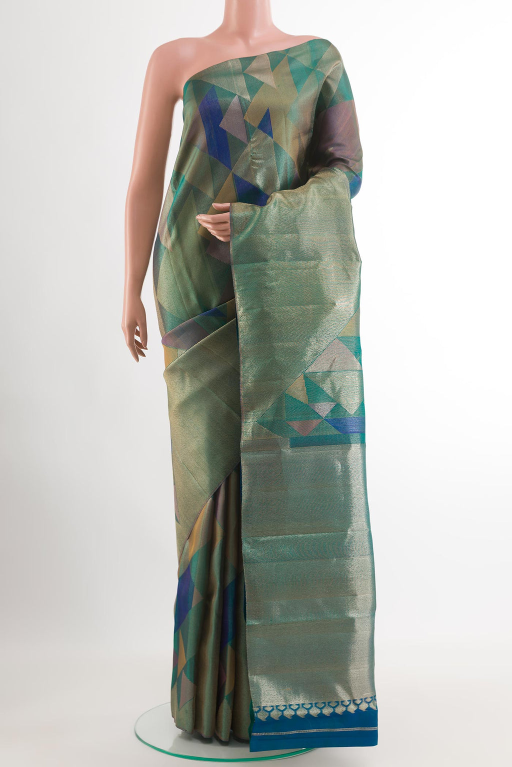 Green Kanjivaram Silk Saree with Zari Brocade on the body and Zari Border.  displayed on a mannequin