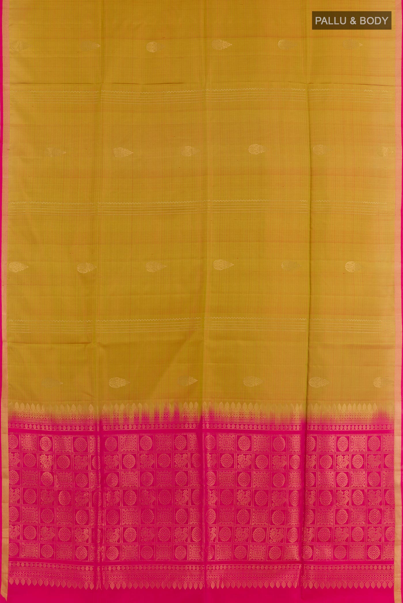Flat view of Mustard Soft Silk Saree with Zari Butta on the body and Zari Border. 