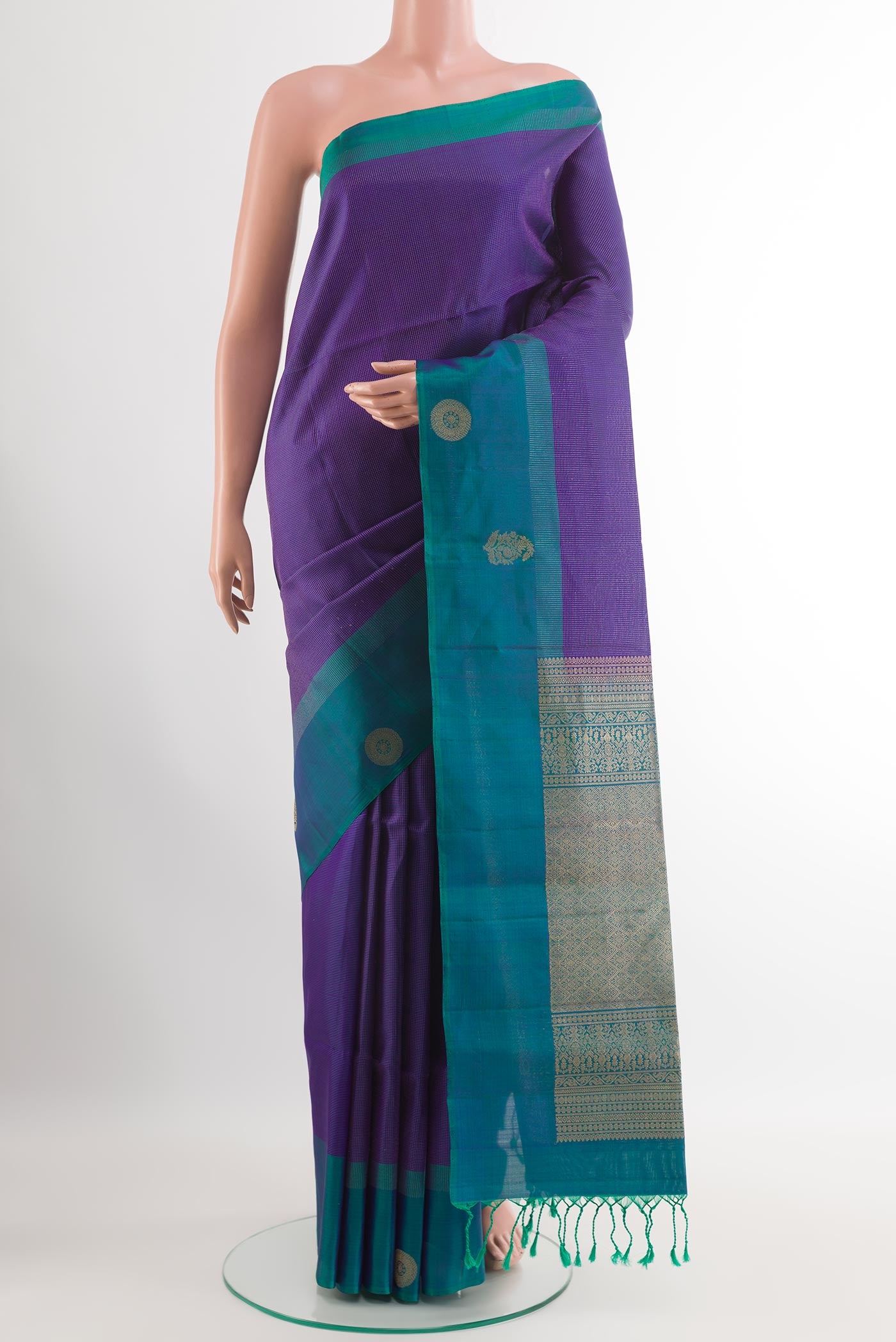 Dark Blue Soft Silk Saree with Checked design on the body and Zari Border.  displayed on a mannequin