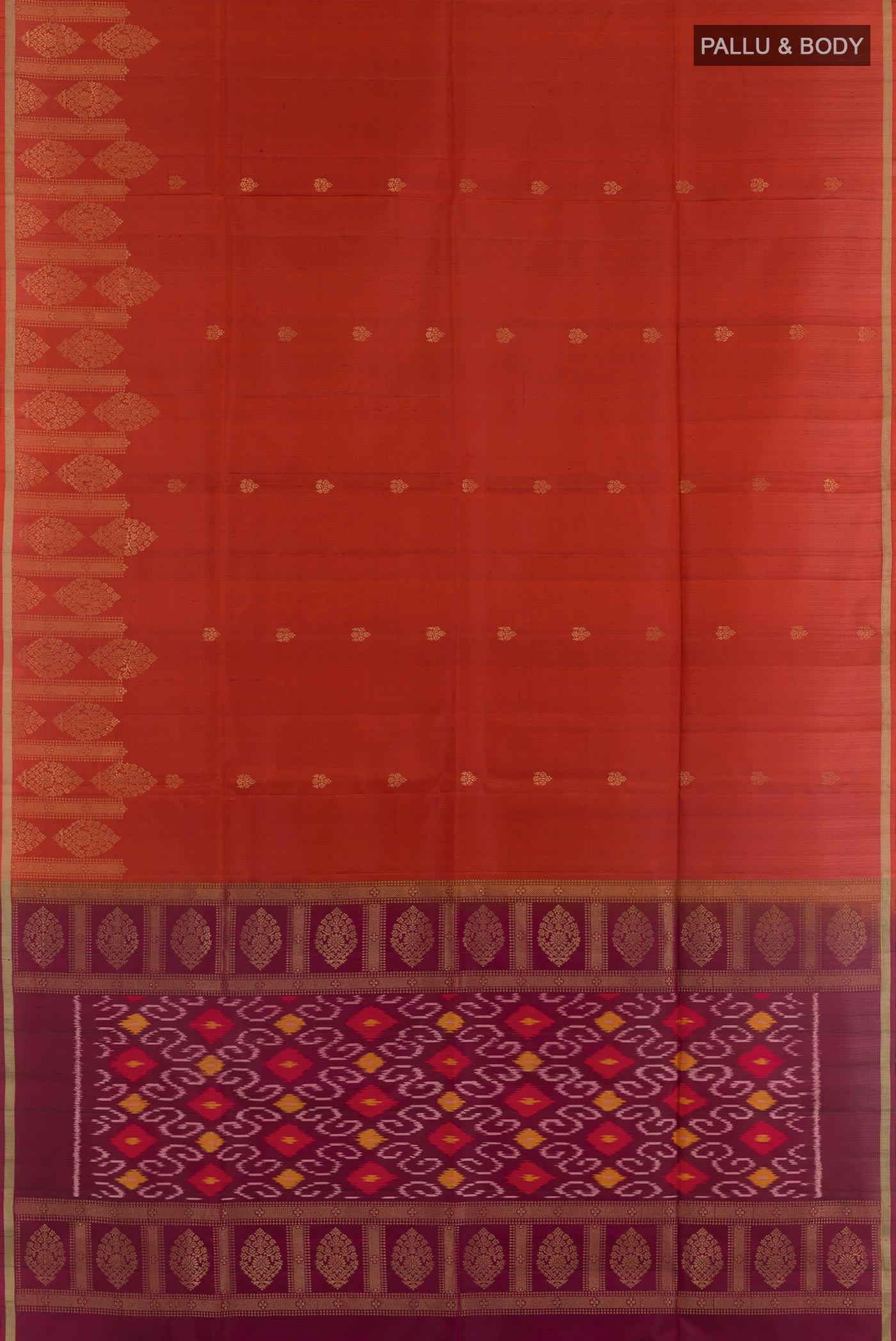 Flat view of Maroon Soft Silk Saree with Zari Butta on the body and Zari Border. 