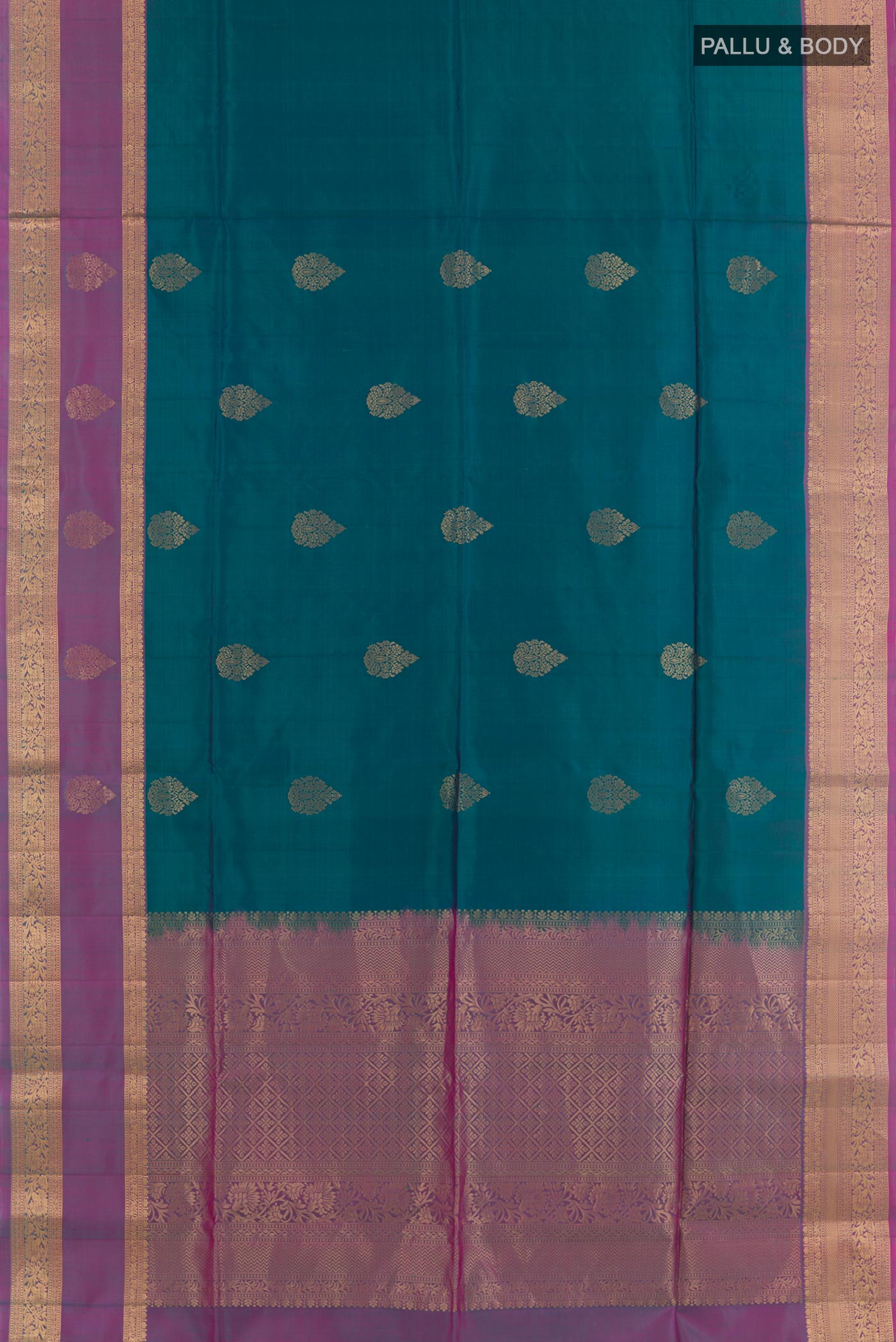 Flat view of Peacock Blue Soft Silk Saree with Zari Butta on the body and Zari Border. 