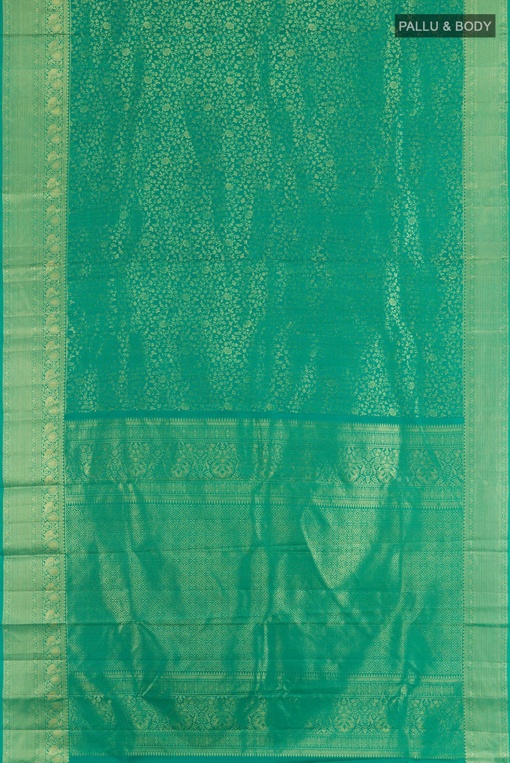Flat view of Green Kanchipuram Silk Saree with Zari Brocade on the body and Zari Border. 