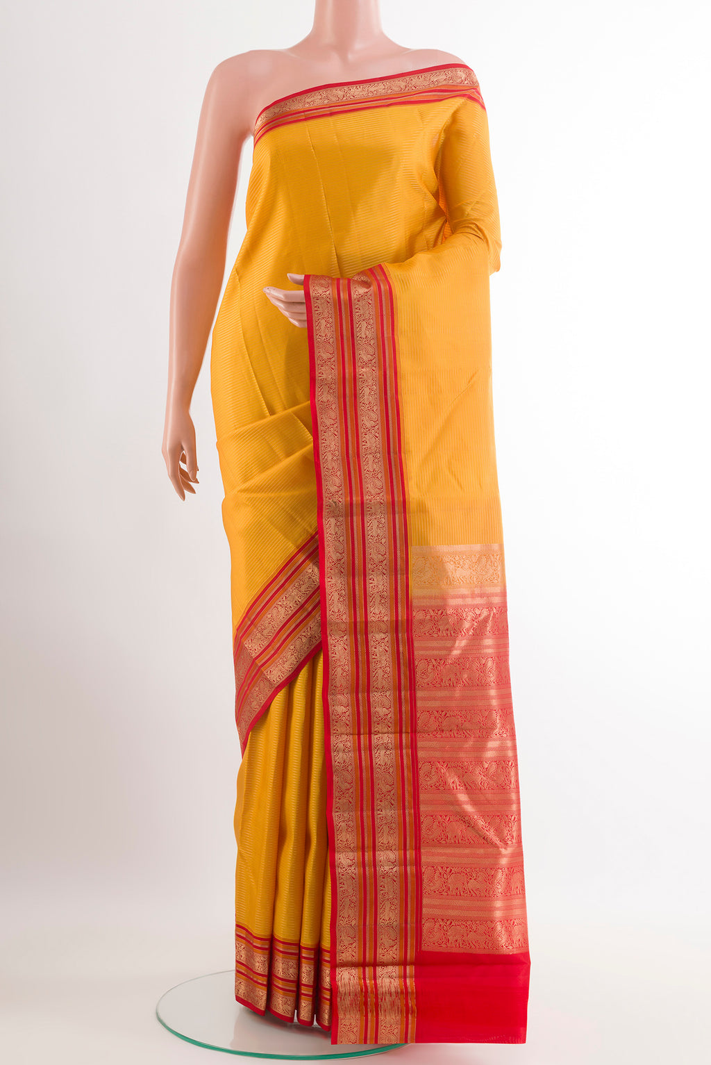 Yellow Kanjivaram Silk Saree with Stripes on the body and Zari Border.  displayed on a mannequin