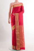 Red Kanchipuram Silk Saree with Zari Butta on the body and Zari Border.  displayed on a mannequin