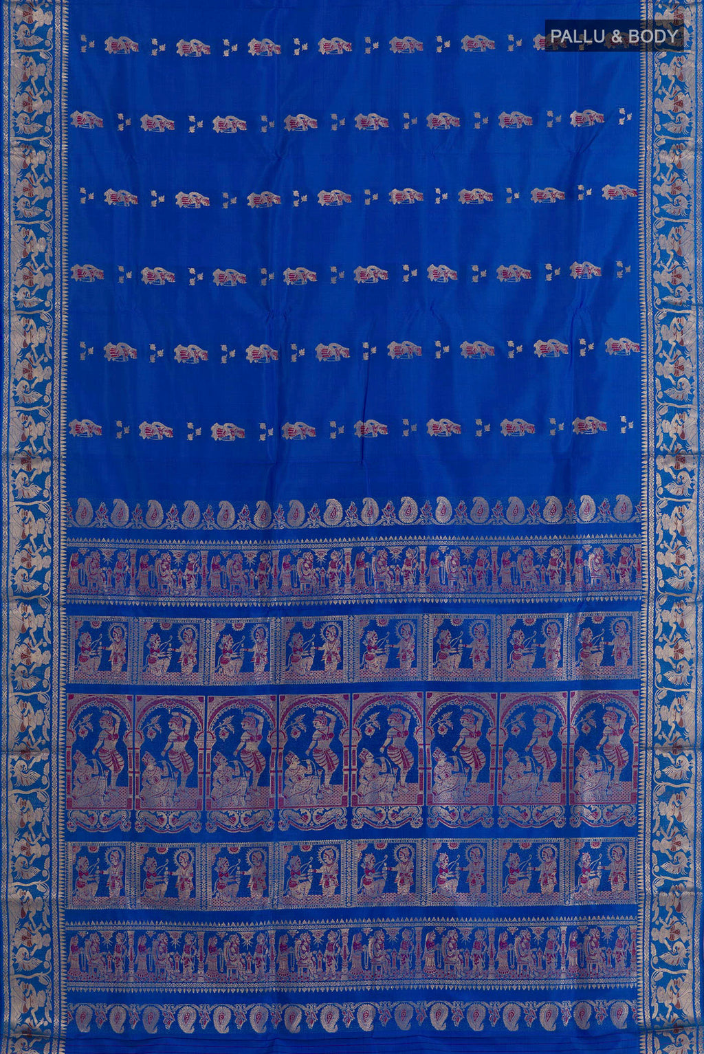 Flat view of Blue Baluchari Silk Saree with Zari Butta on the body and Zari Border. 
