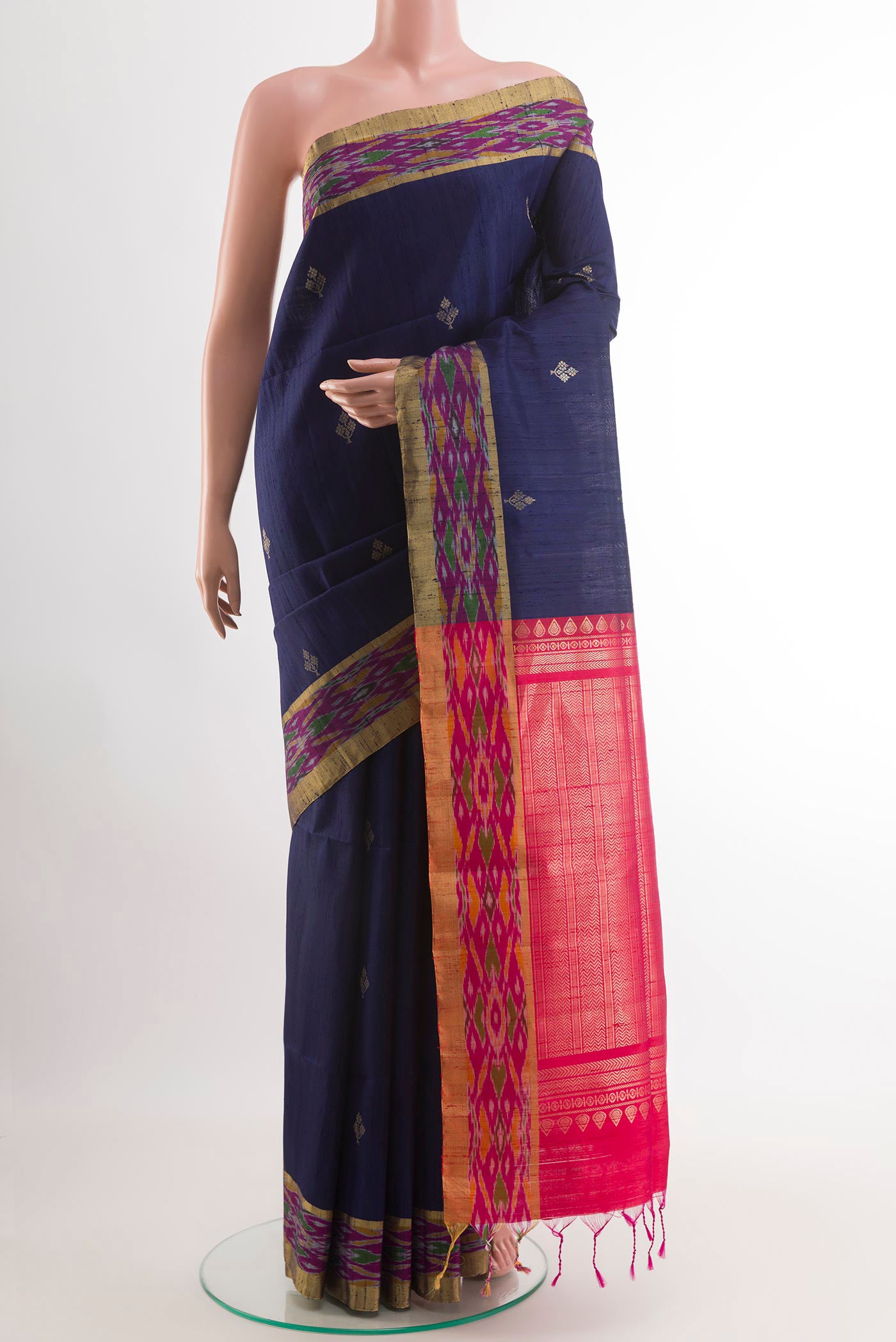 Blue Raw Silk Saree with Zari Butta on the body and Zari Border.  displayed on a mannequin