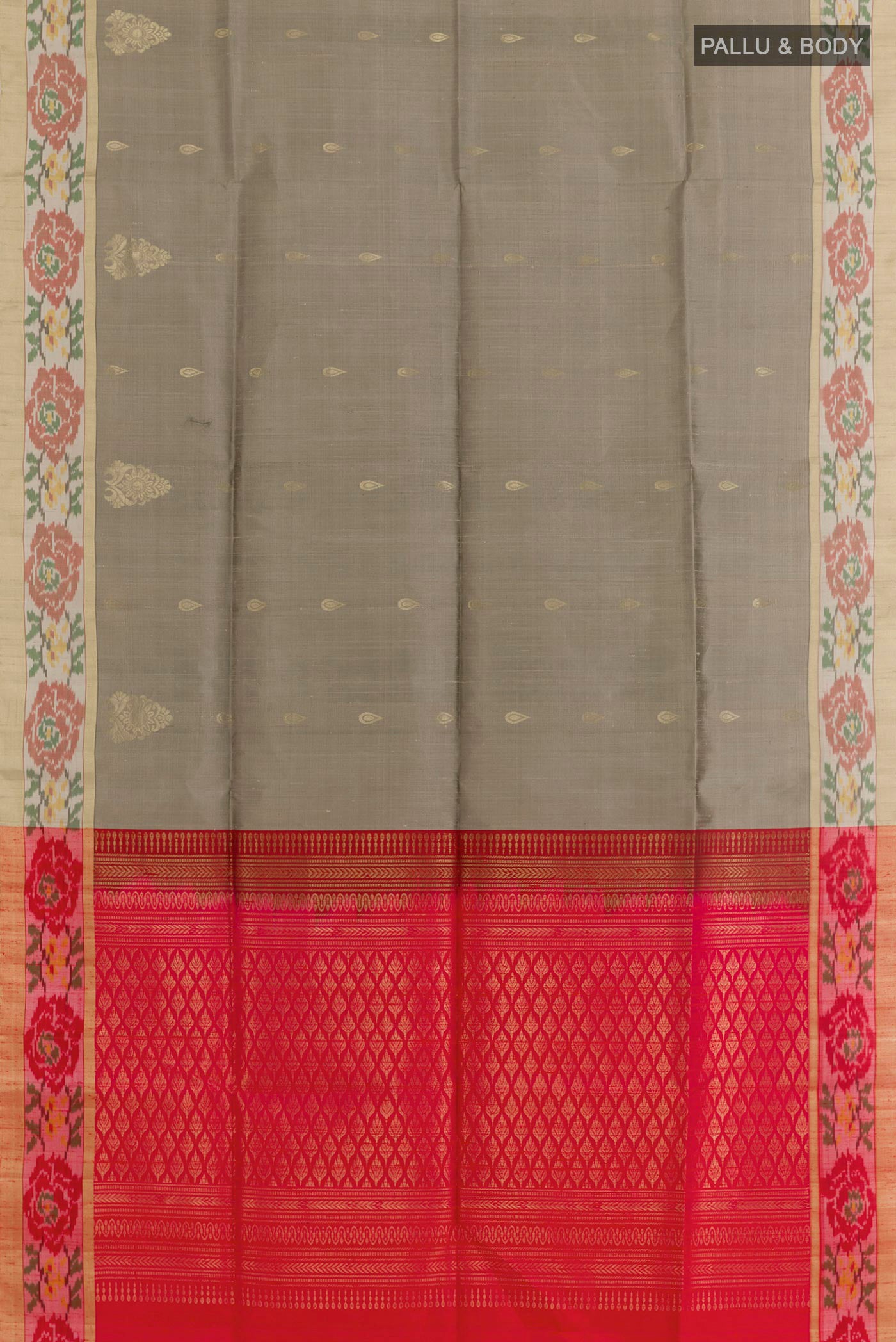 Flat view of Grey Soft Silk Saree with Zari Butta on the body and Zari Border. 