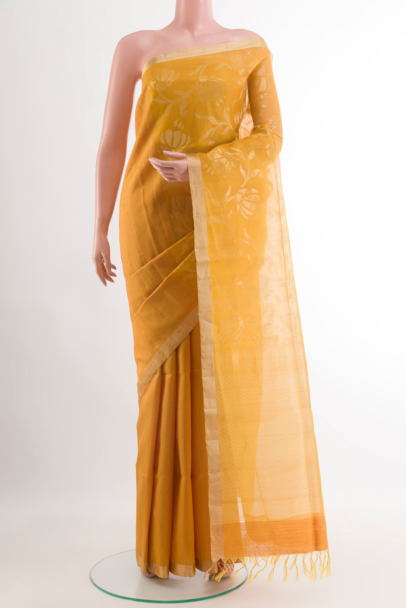 Yellow Raw Silk Saree with Plain Body and Zari Border.  displayed on a mannequin
