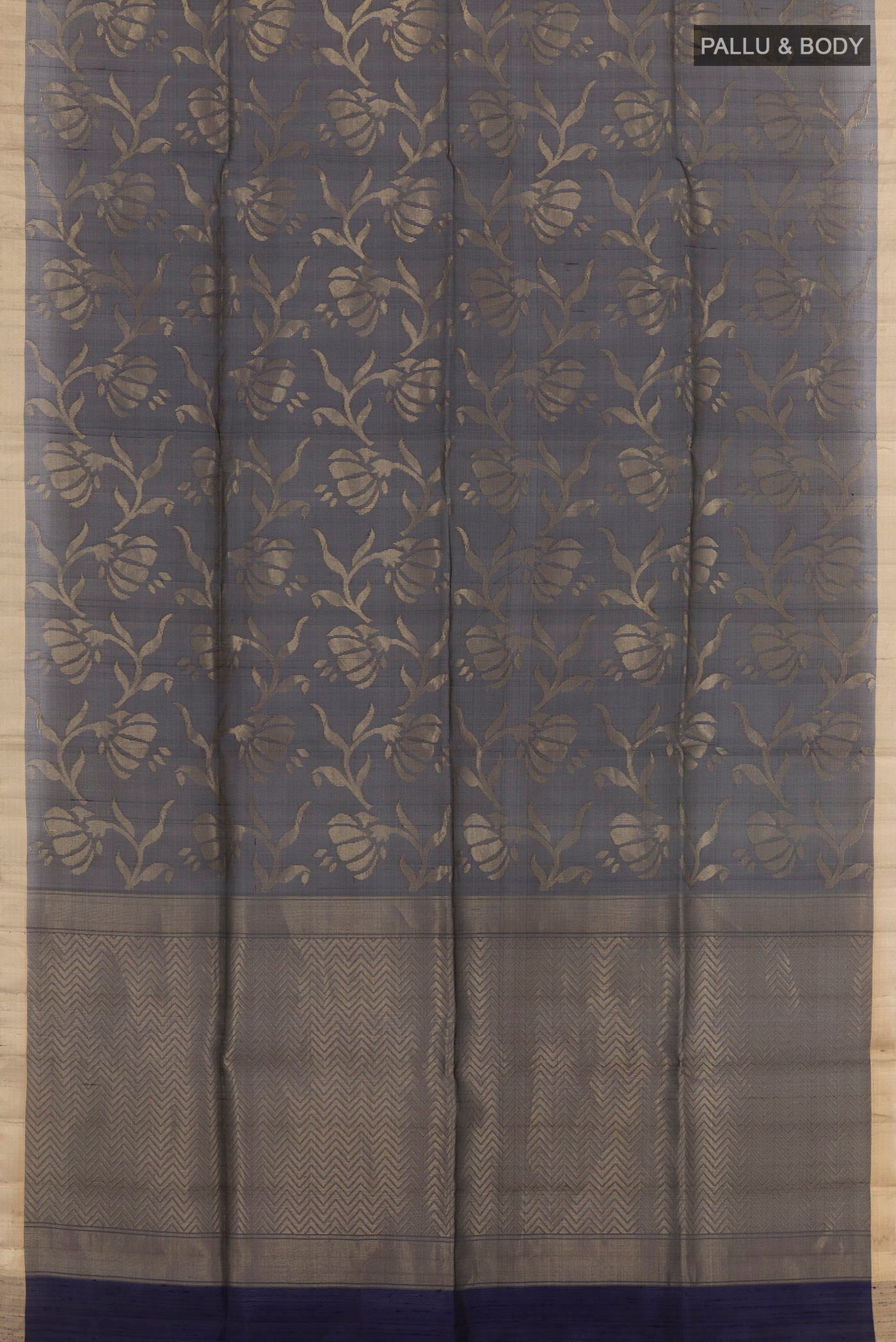 Flat view of Dark Blue Raw Silk Saree with Plain Body and Zari Border. 