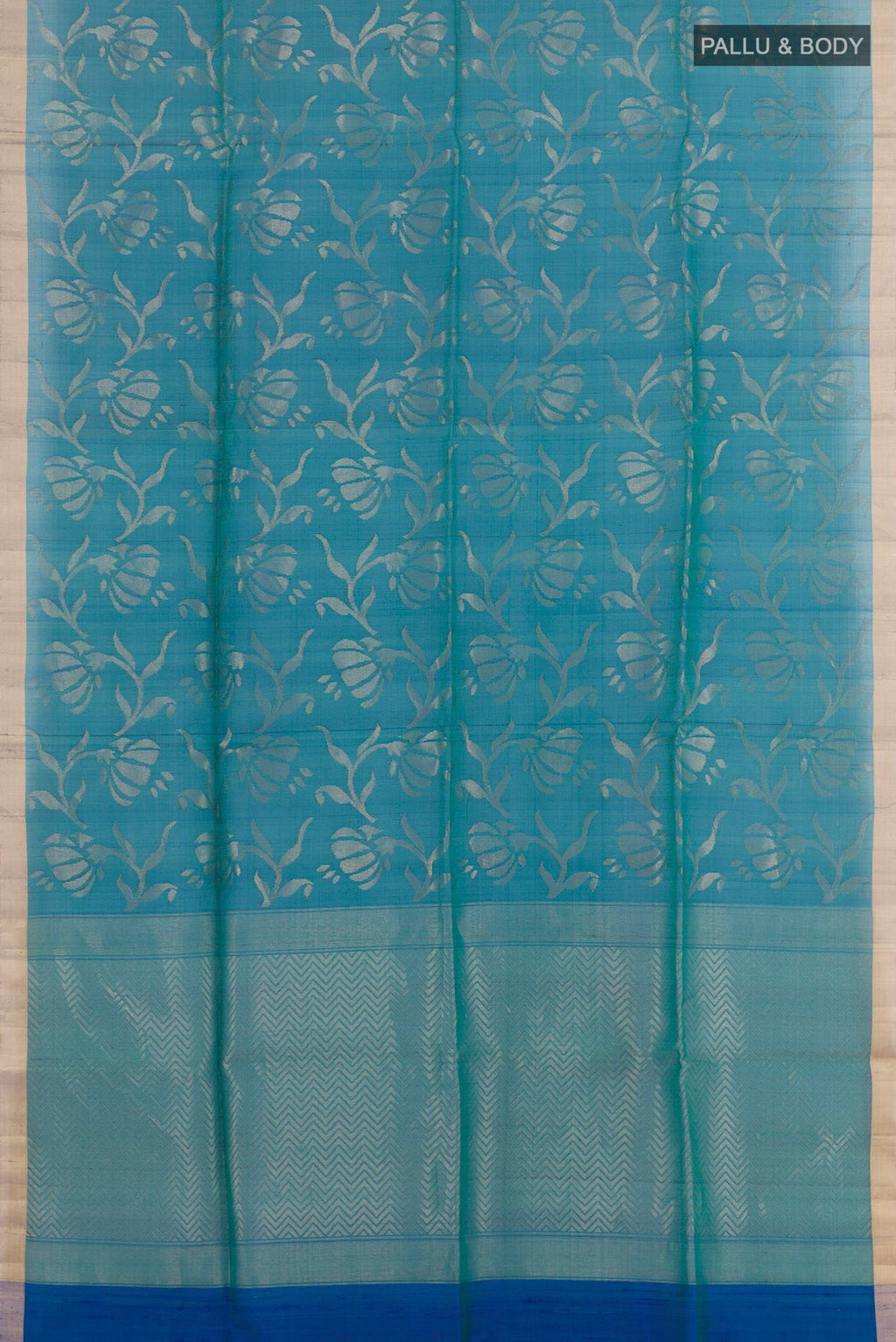 Flat view of Blue Raw Silk Saree with Plain Body and Zari Border. 
